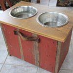 photo of elevated dog bowl station with extra food storage